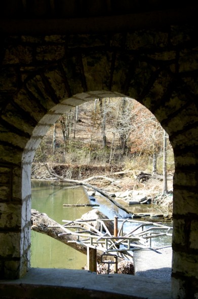 Just outside the distillery, Glenn's Creek flows. The well house is a dilapidated and covered in funk. 