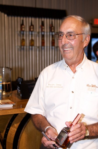 Parker Beam signing whiskey bottles at the 2011 Bourbon Festival in Bardstown, Ky. Mr. Beam is the master distiller for Heaven Hill Distilleries. He was diagnosed with ALS in 2010, but announced the illness to his fans in 2013. 