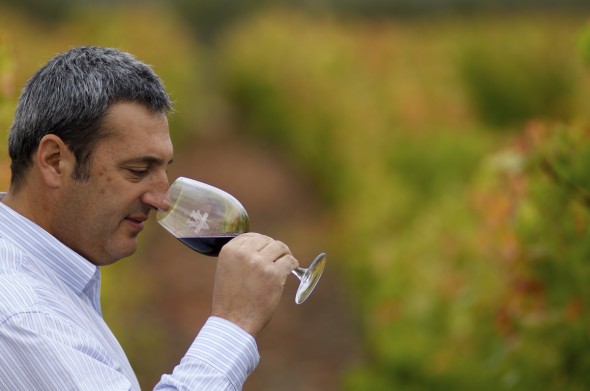 Head Winemaker Felipe Tosso joined Viña Ventisquero in 2000, and here he noses a Carmenere. 