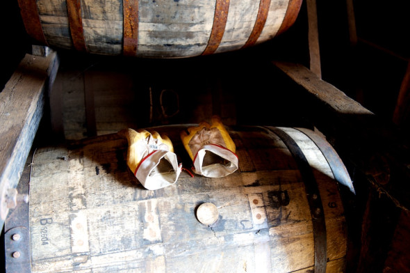 Barrels fascinate me. They fascinate me even more when gloves sit atop them with shadows. Who was working these barrels and whose whiskey is this? Questions surround every barrel at MGPI.