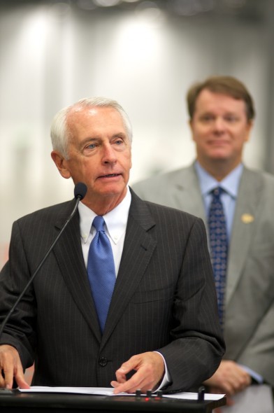 Governor Steve Beshear delivers the economic impact to the media at the new Jim Beam distribution center in Frankfurt, Ky.  Standing behind Beshear is KDA president Eric Gregory. 