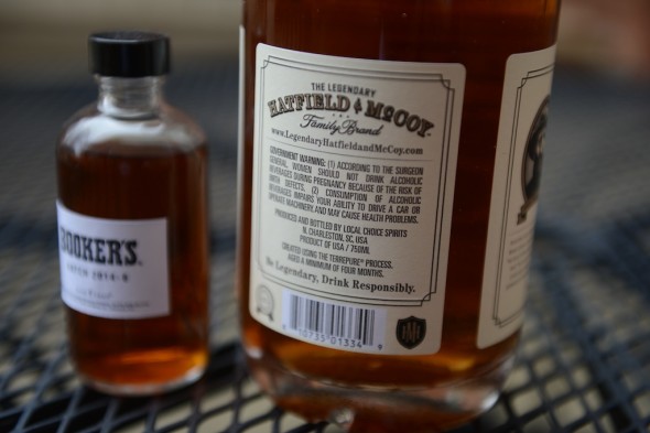 In this side-by-side comparison with a Booker's media sample (left) and a Hatfield & McCoy TerrePURE whiskey, you can see the color stands up to a traditionally aged bourbon. There is no coloring disclosure on the Hatfield & McCoy label.