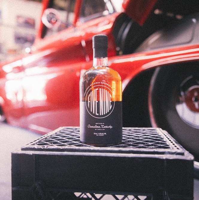 Five Nine Whiskey lifestyle shot with car