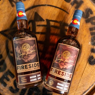 Mile High Spirits Fireside Whiskeys bottles on barrel head