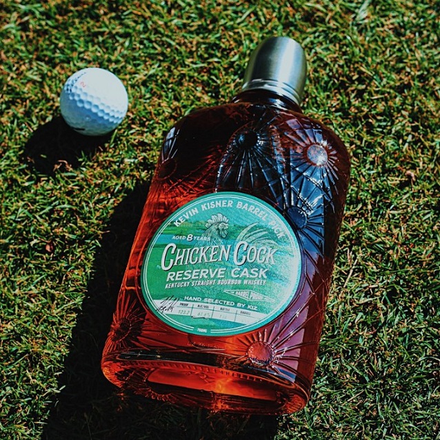 Chicken Cock Reserve Cask Kevin Kisner bottle with golf ball on green