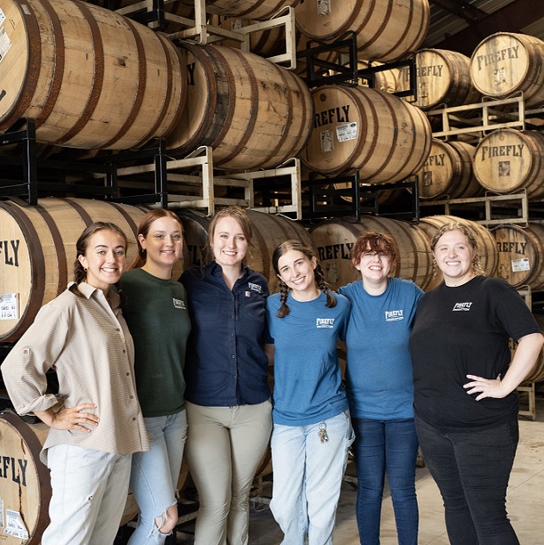 Firefly Distillery production team in rickhouse
