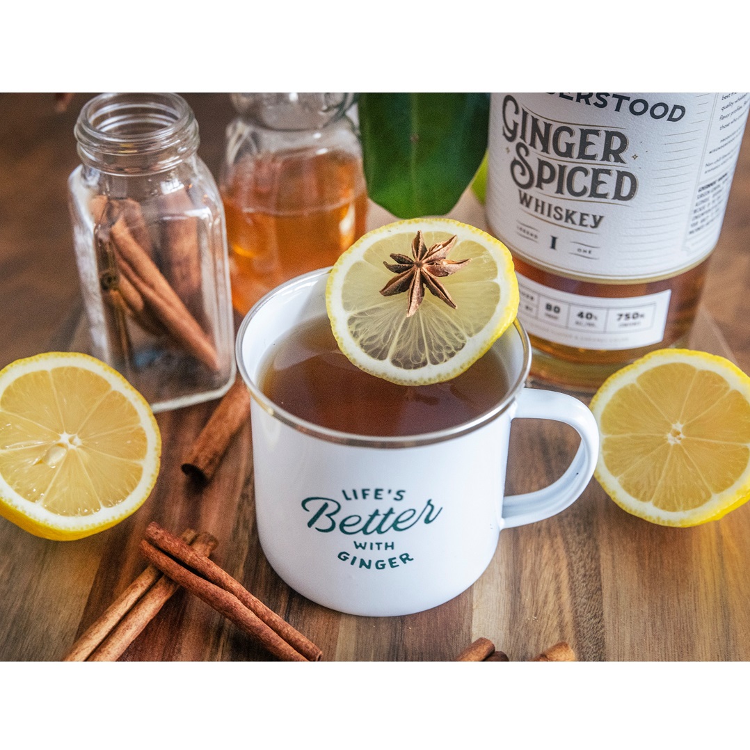 Misunderstood Whiskey Co. Ginger Spiced Hot Toddy with bottle and ingredients