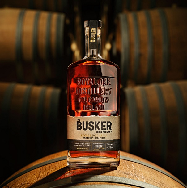 The Busker Small Batch Single Pot Still bottle on barrel