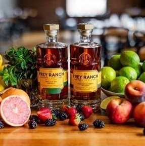 Frey Ranch bottles with fruit