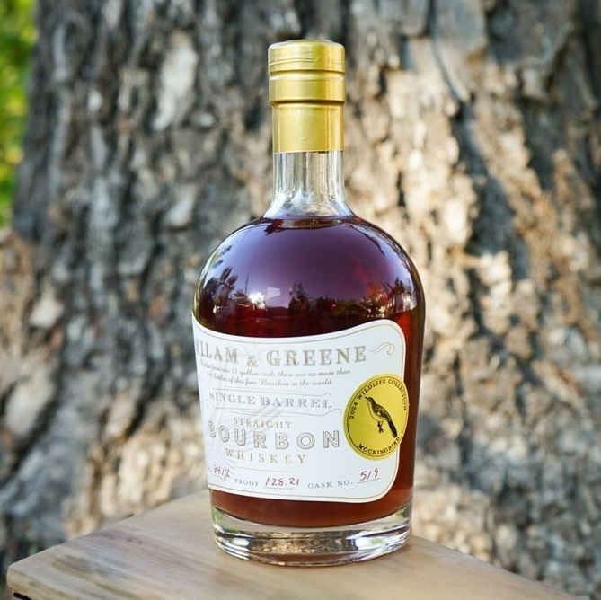 Milam Greene Wildlife Collection Mockingbird Single Barrel bottle by tree