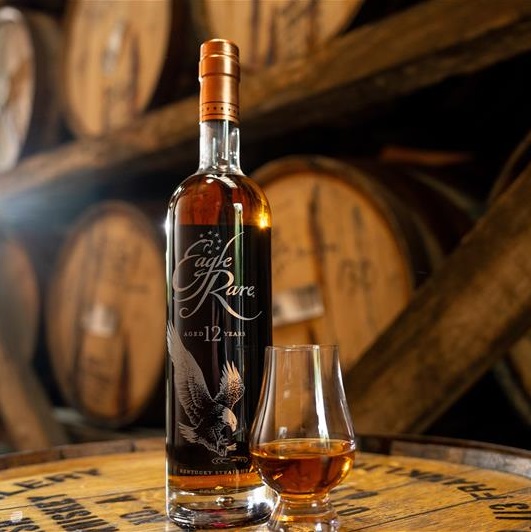 Eagle Rare 12 bottle and pour in rickhouse