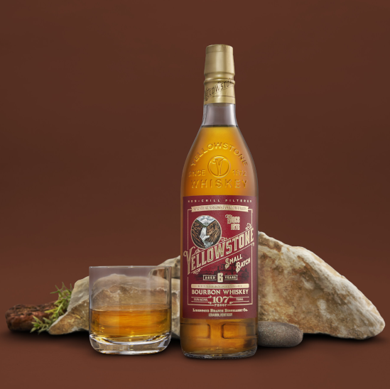 Yellowstone Bourbon Small Batch 107 bottle with glass