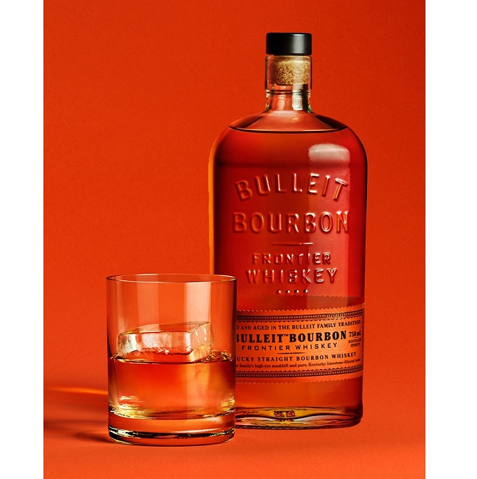 Bulleit Doing Over Dreaming brand bottle and glass