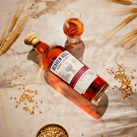 Heaven Hill Grain to Glass 2025 Kentucky Straight Wheated Bourbon Whiskey bottle and glass