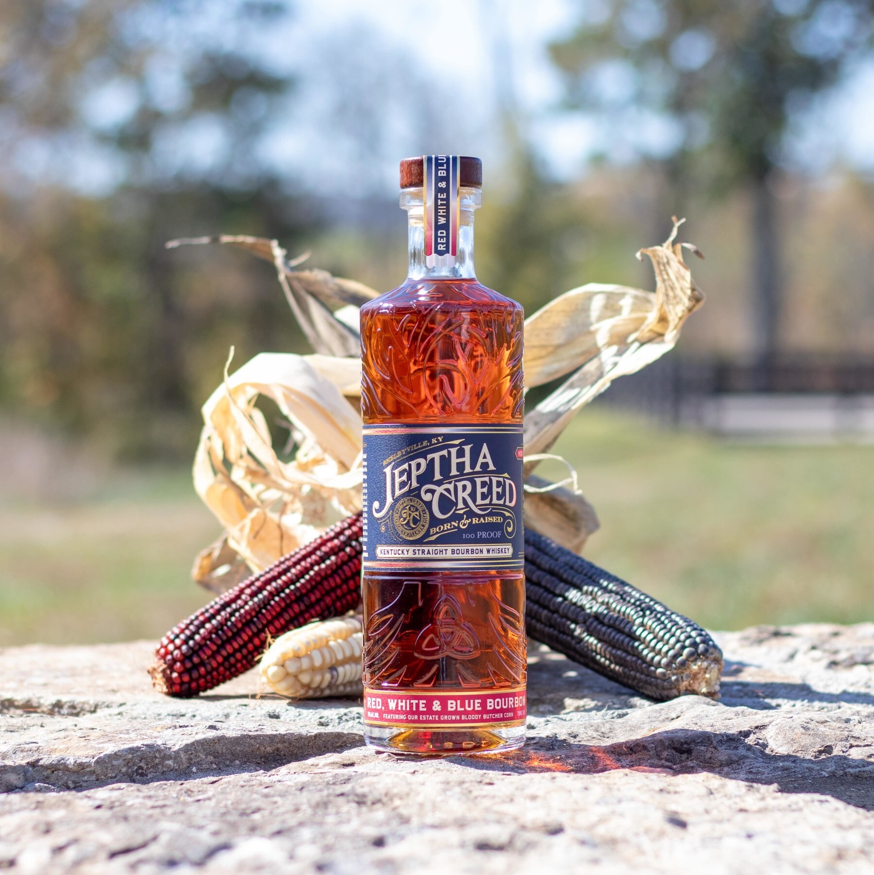 Jeptha Creed DistilleryRed White & Blue bottle with corn