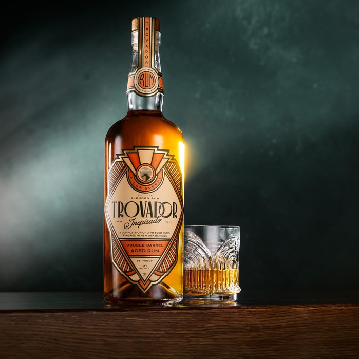 Trovador Inspirado Double Barrel Aged Rum bottle and drink