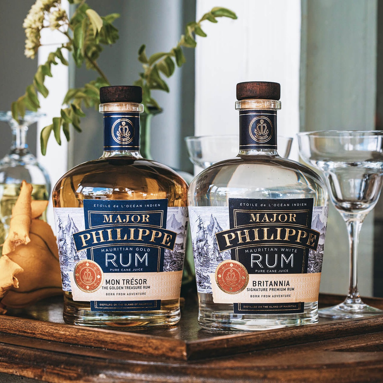 Major Philippe Rum bottles on table