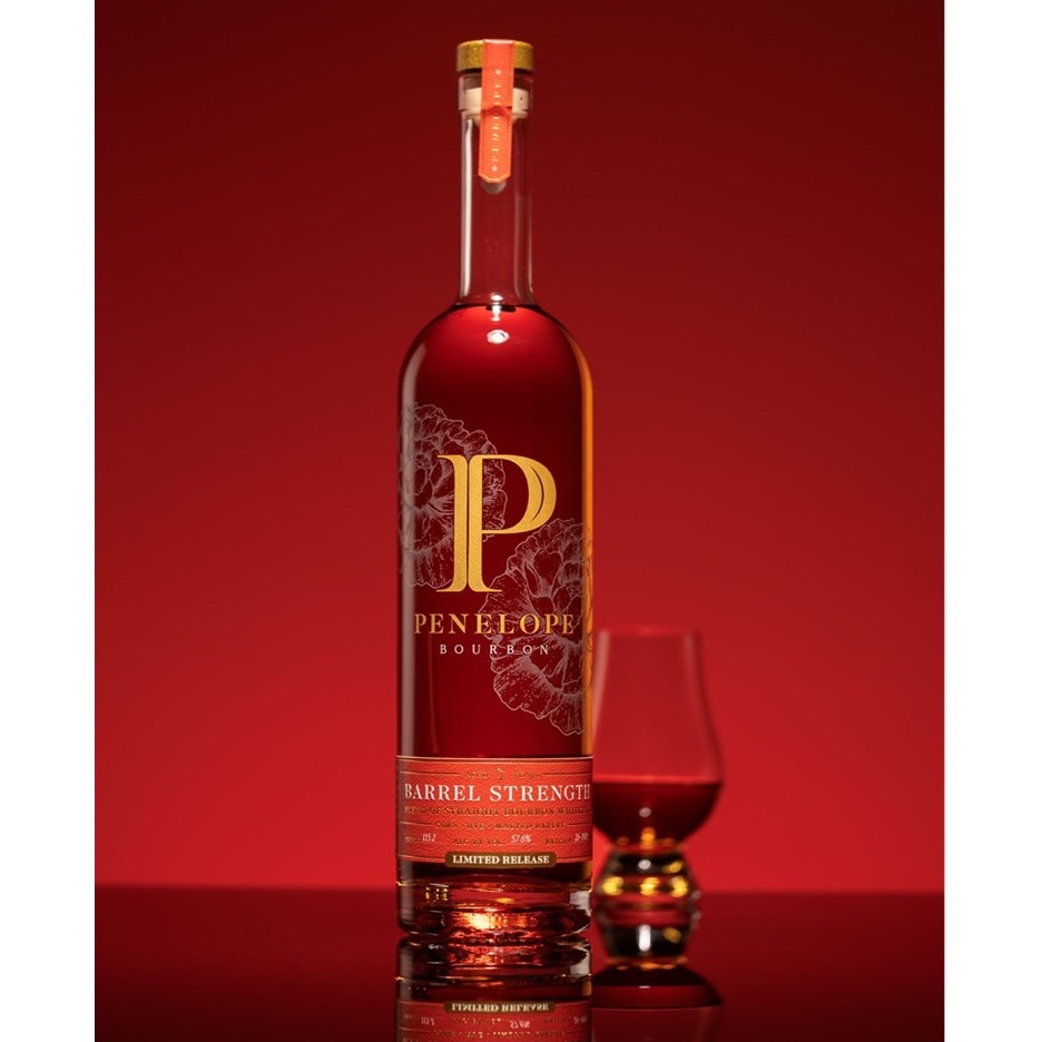 Penelope Bourbon 7 Year Barrel Strength bottle with pour
