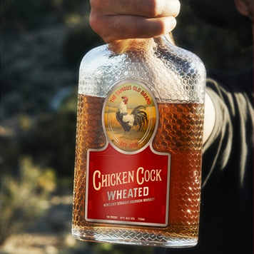 Chicken Cock Whiskey Wheated Bourbon bottled and hand