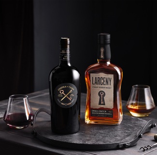 Cooper & Thief Larceny bottles with drinks