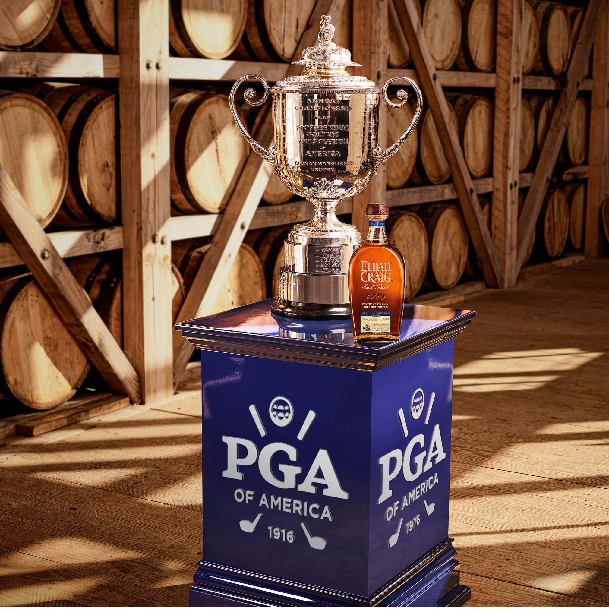 Elijah Craig bottle with PGA Trophy