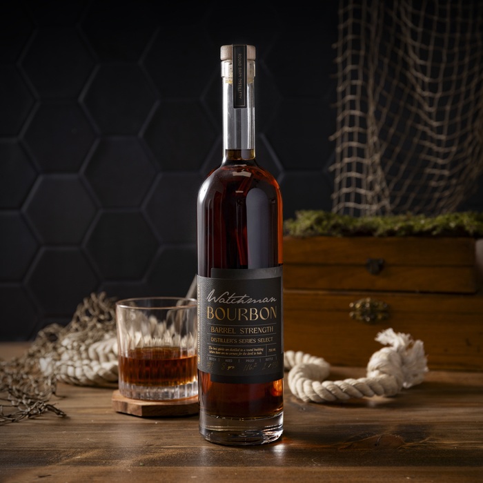 Round Barn Distillery Watchman Barrel Strength bottle with pour