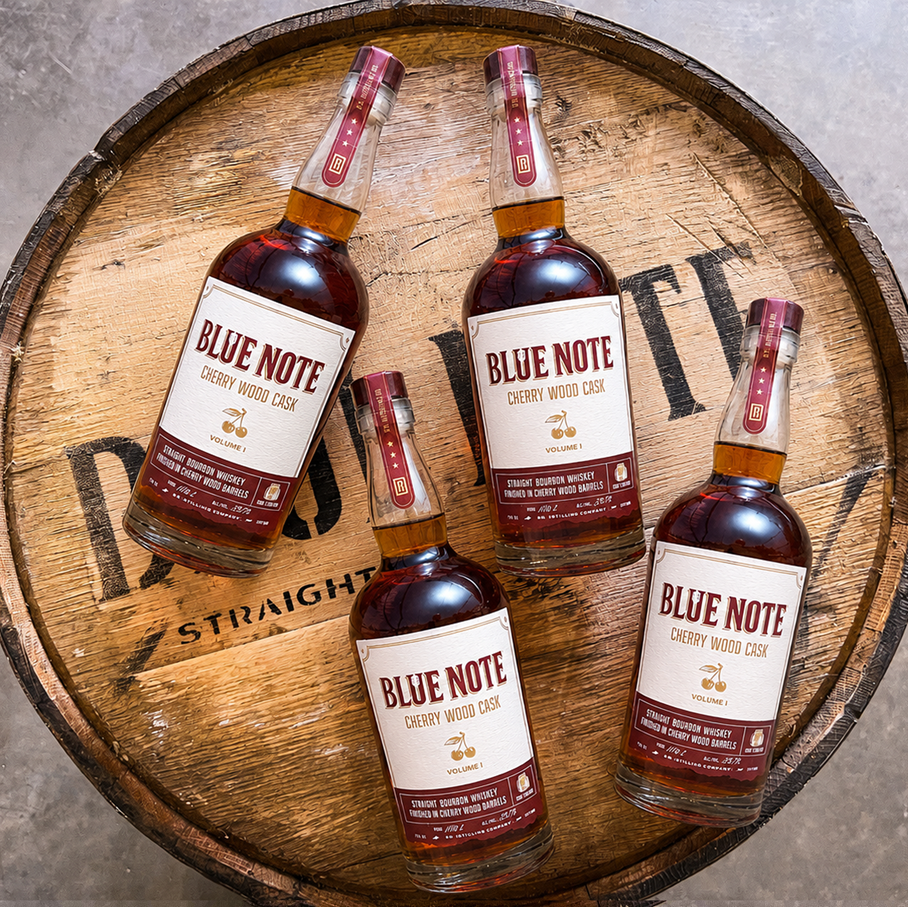 BLUE NOTE CHERRY WOOD CASK BOTTLES on barrel top