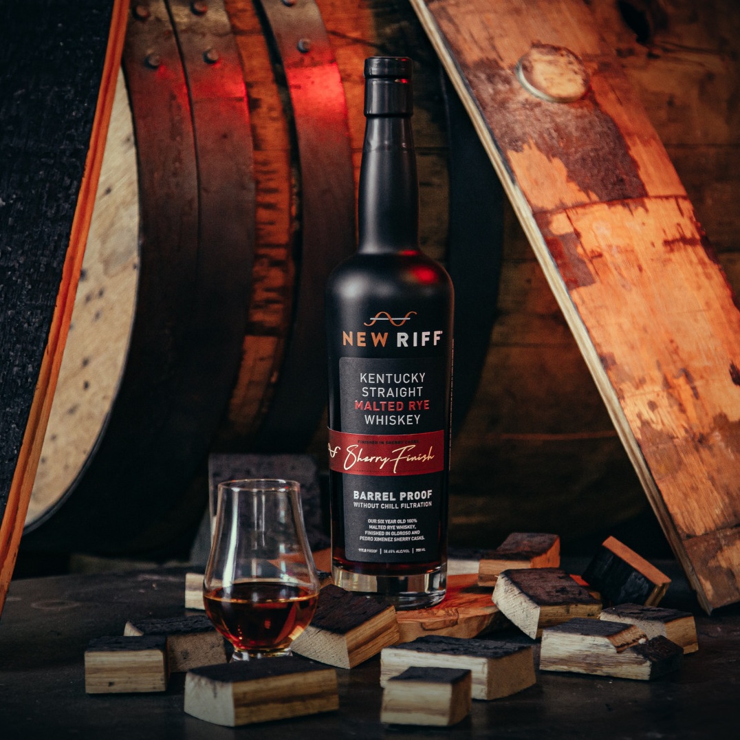 New Riff Sherry Finished Malted Rye bottle with staves and pour