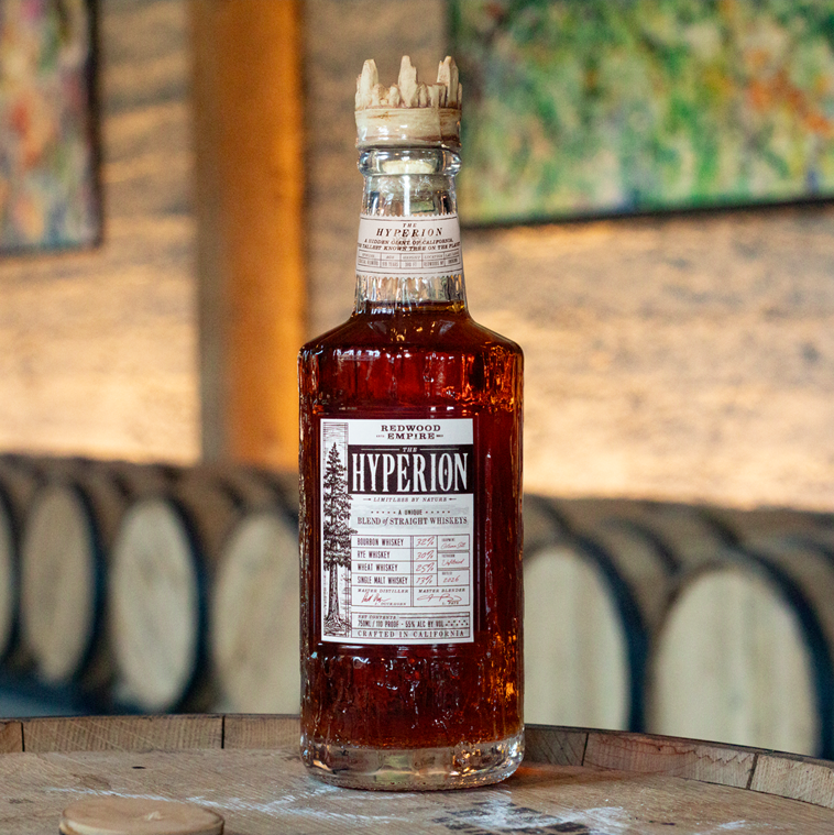 Redwood Empire Hyperion Whiskey bottle on barrel