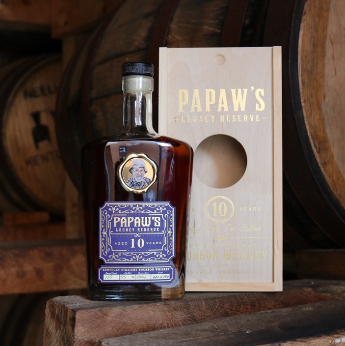 Neeley Family Distillery PaPaw's Legacy Reserve bottle and box in rickhouse