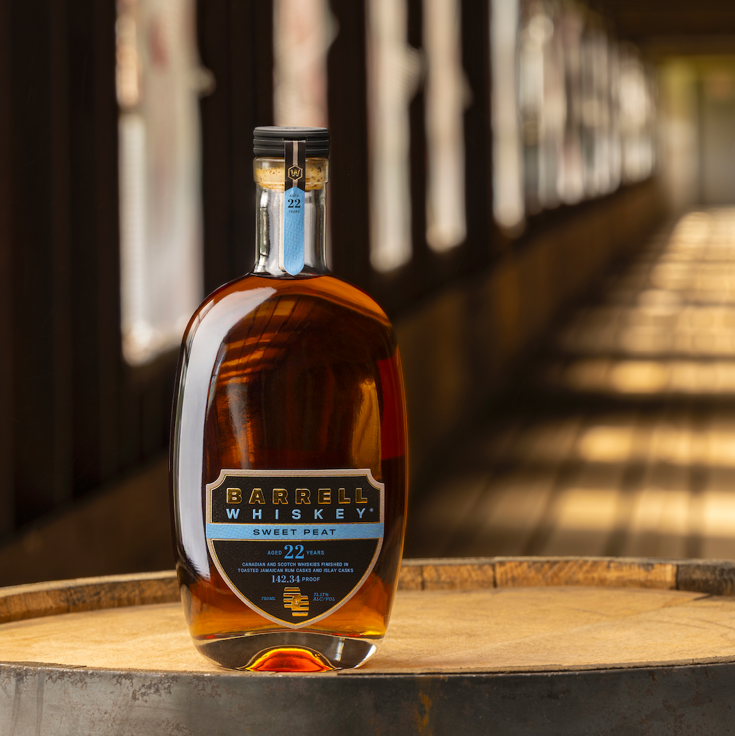 Barrell Craft Spirits Sweet Peat bottle in rickhouse