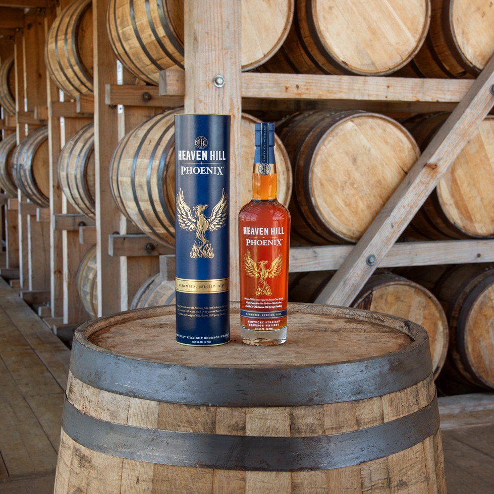 Heaven Hill Phoenix bottle and Carton in rickhouse