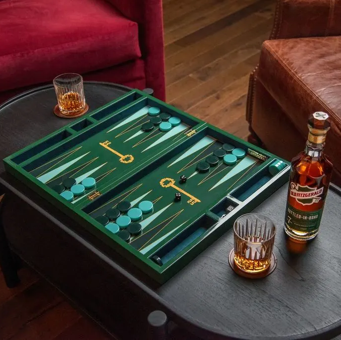 Old Fitzgerald Backgammon table with bottle and pour